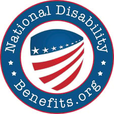 National Disability Benefits.org logo with a blue circular design featuring an American flag shield and white stars